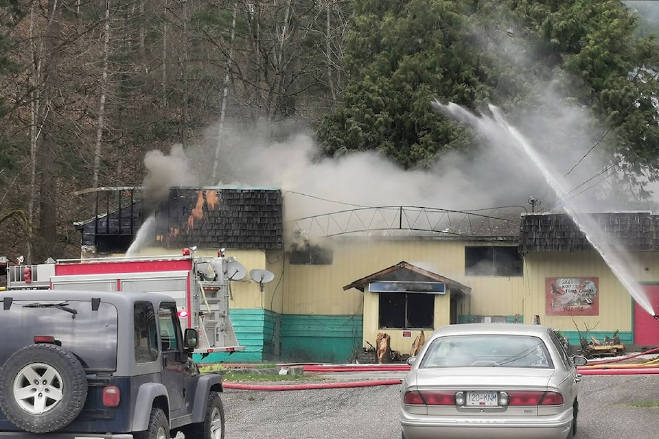 Part of the Gold Nugget Motel burned in Yale as the local fire department doused the flames on Friday, April 2. No one was hurt. (Photo/Kat Stirling)