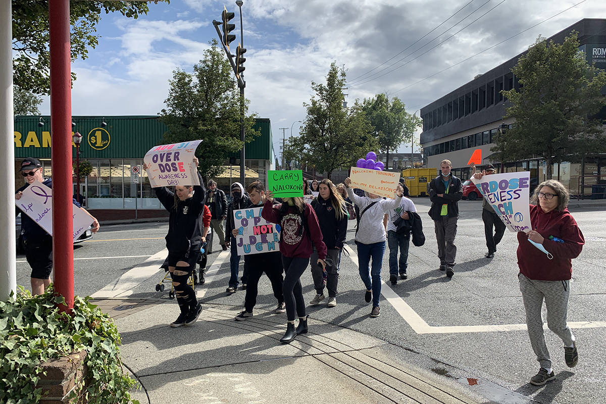 People marched from Jubilee Park through downtown Abbotsford on Aug. 31, 2021, to mark International Overdose Awareness Day. (Jessica Peters/ Abbotsford News)