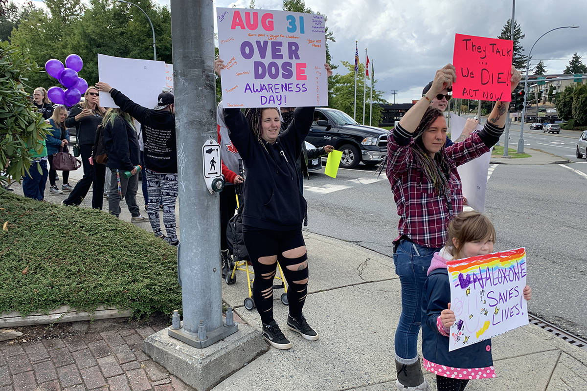 People marched from Jubilee Park through downtown Abbotsford on Aug. 31, 2021, to mark International Overdose Awareness Day. At right is Drug War Survivor program coordinator Brittany Maple. (Jessica Peters/ Abbotsford News)