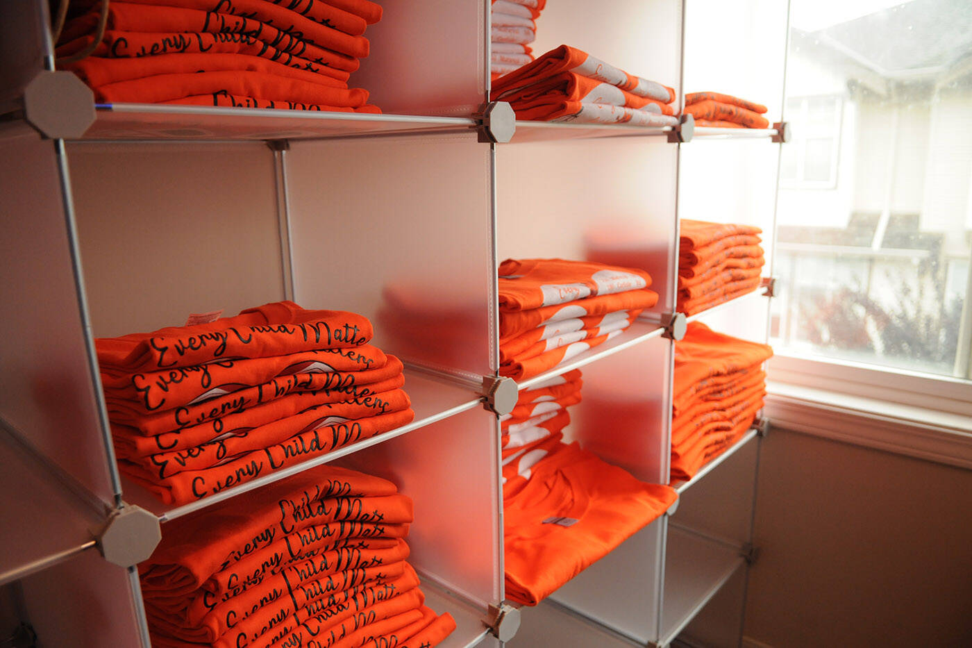 Shawn E. Baginski had almost 1,000 orange shirts printed. He sold all of them, without making a single cent in profit, and raised thousands of dollars for survivors of residential schools. (Jenna Hauck/ Chilliwack Progress)