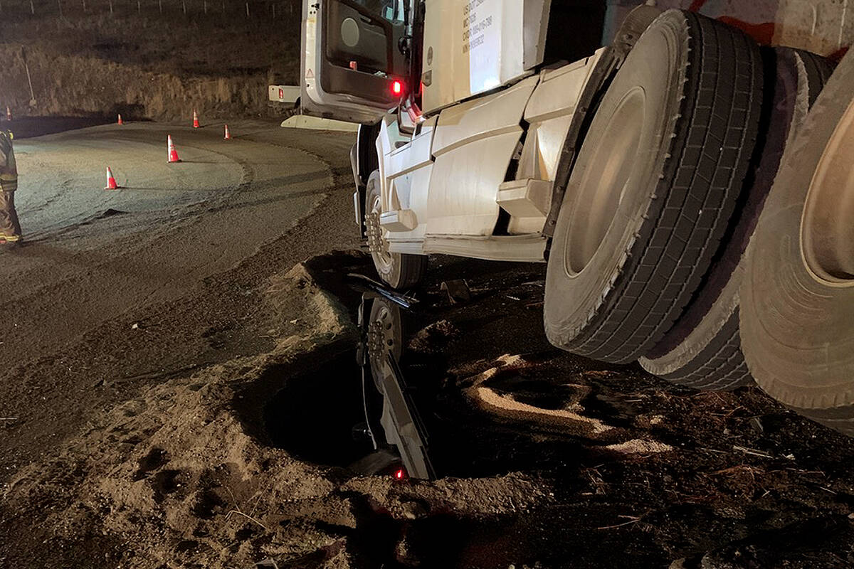 Firefighters contained much of the spill by piling up roadside earth to create small dams. Photo: Submitted