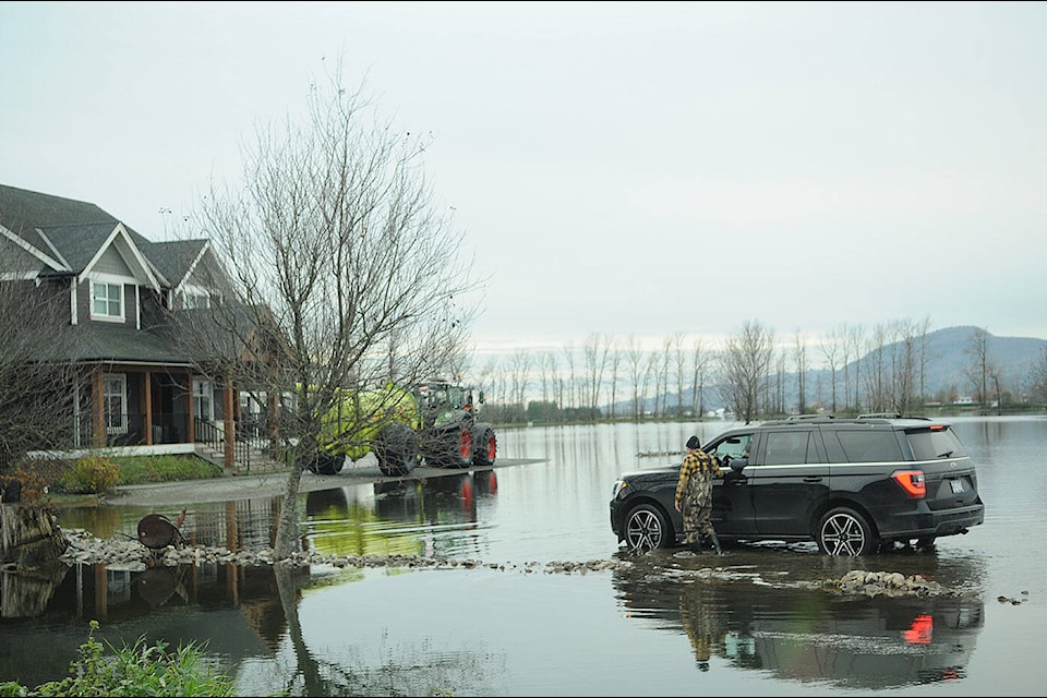 A flooded property in Abbotsford along Boundary Road on Wednesday, Nov. 24, 2021. (Jenna Hauck/ Chilliwack Progress)