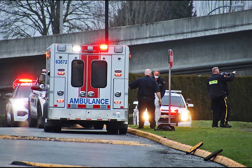 The stabbing victim, who was in the ambulance when this photo was taken, was transported to Royal Columbian Hospital. (Shane MacKichan/Special to The News)