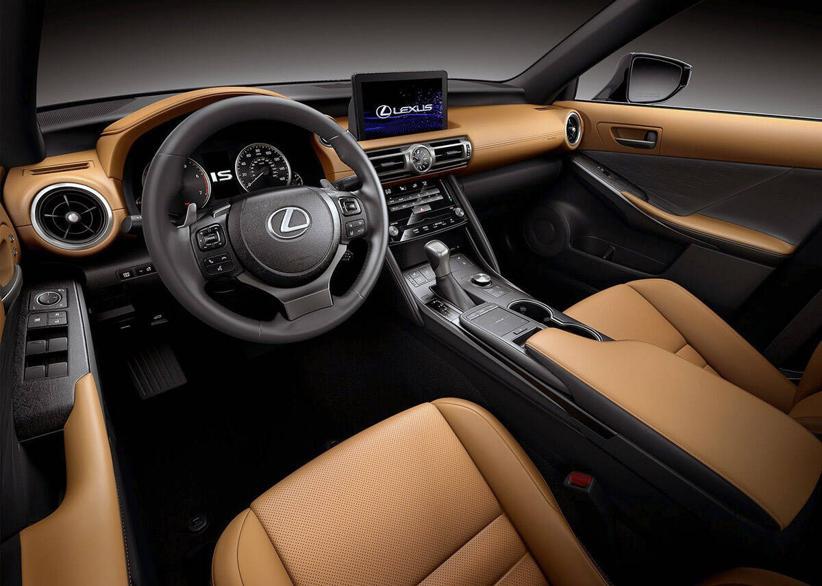 The Lexus ISs interior is a tight fit, which makes sense given the small size of the car. Reaching for the touch-screen can require especially long arms or you can use the touchpad on the console. PHOTO: LEXUS