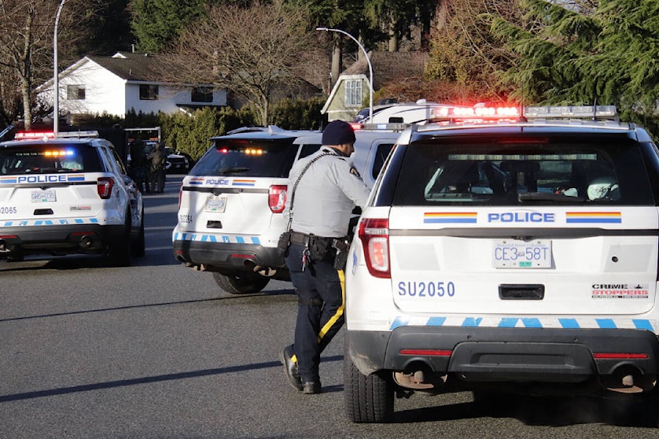 RCMP Emergency Response Team took one man into custody after a standoff at a Surrey home Sunday morning. (Shane MacKichan photos)