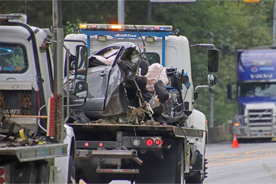 Wreckage was removed from the scene of a crash that killed two people in Maple Ridge Saturday night (July 16) around 11:30 p.m. on Lougheed Highway between 272nd and 280th Streets. (Shane MacKichan/Special to Maple Ridge-Pitt Meadows News)