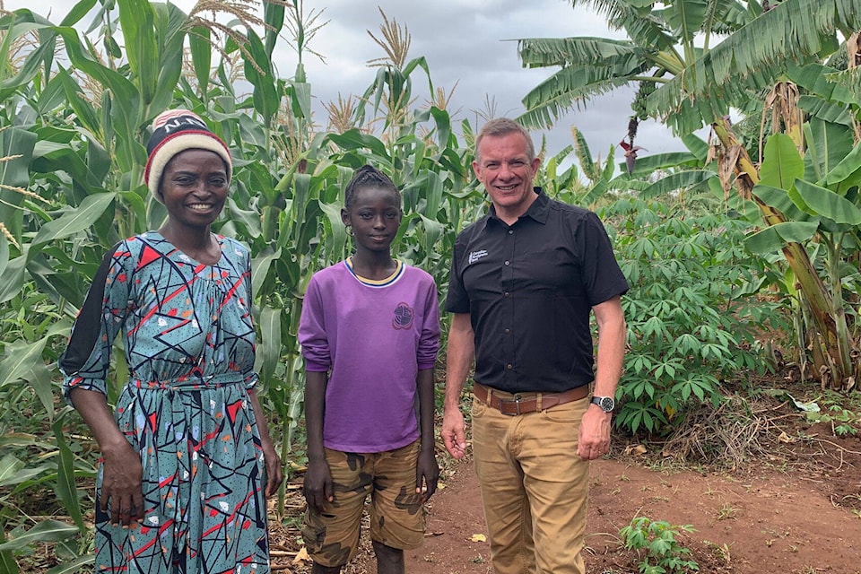 Chilliwack’s Andy Harrington (right), executive director with Canadian Foodgrains Bank, meet with farmers and others in Ethiopia in July. This farmer had “a massive explosion in growth,” after one year of being part of a Canadian Foodgrains Bank program. (Submitted by Andy Harrington)