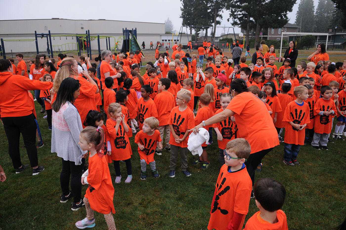 Children gather for a group photo at Bernard Elementary on Thursday, Sept. 29, 2022. The schools parent advisory council bought an orange T-shirt for every single student at Bernard. (Jenna Hauck/ Chilliwack Progress)