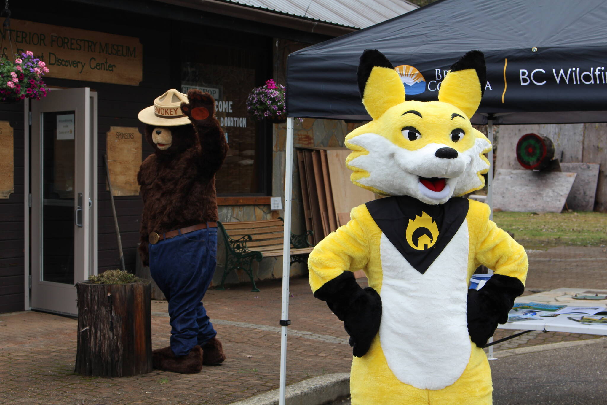 Smokey Bear waving goodbye as Ember the Fox becomes the new face of FireSmart. (Josh Piercey/Revelstoke Review)