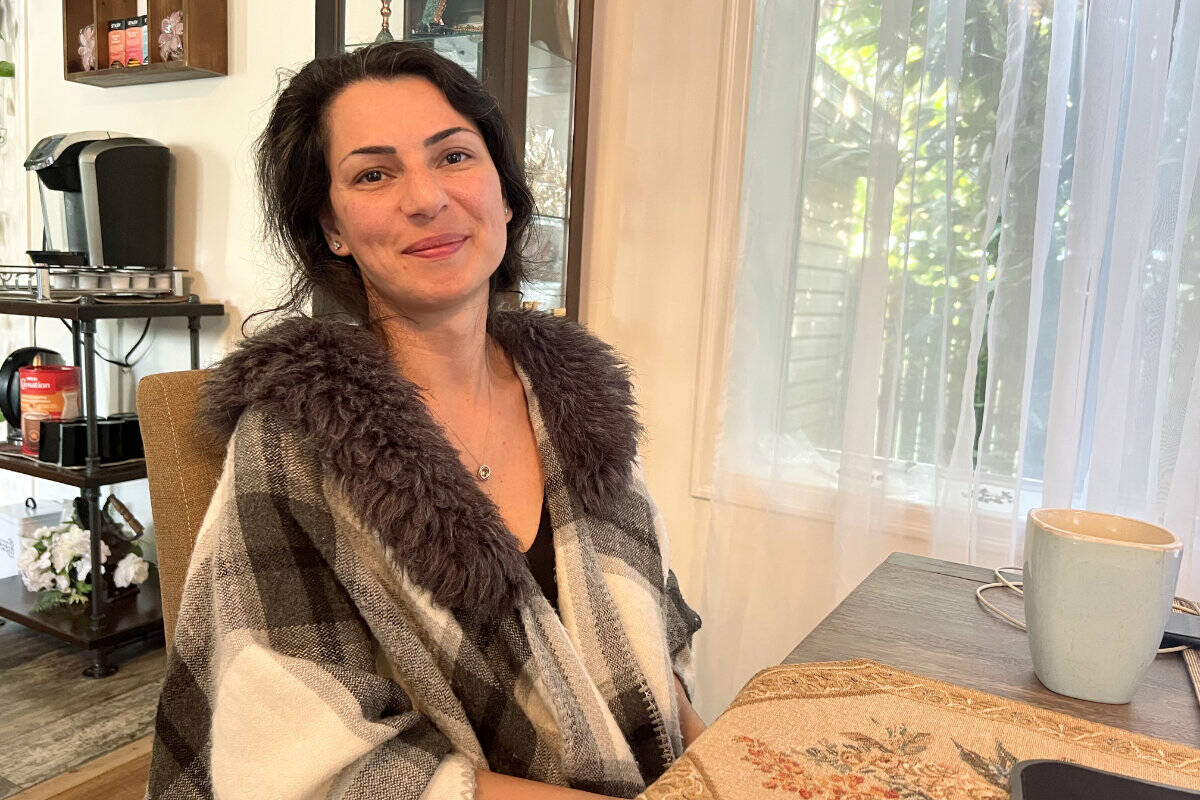 Ghazaleh Nozamani talking about the current protests in her home country of Iran at her house in Yarrow on Oct. 3, 2022. (Paul Henderson/ Chilliwack Progress file)