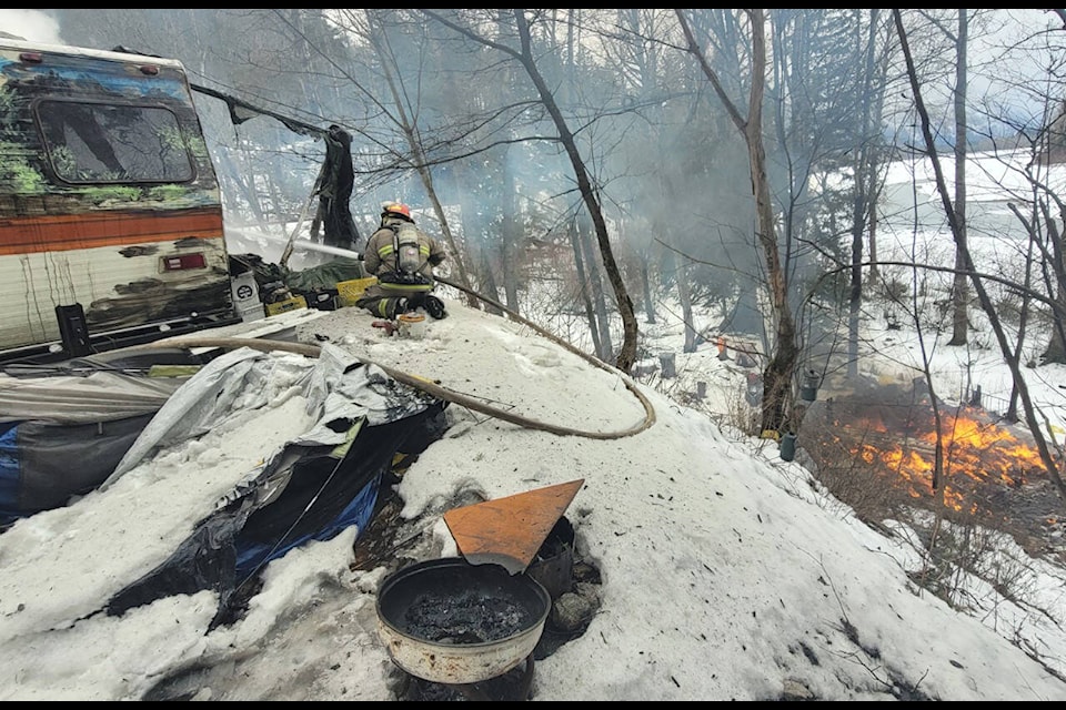 About 15 hours later, Friday afternoon (March 3), six firefighters attended a homeless encampment fire that had spread to a nearby camper, in the 1000 block of Water Avenue. (Hope Fire Chief Thomas Cameron/Hope Fire Department)