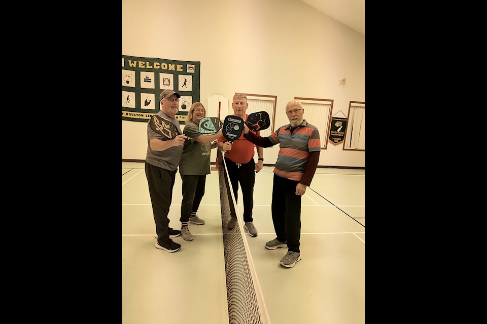 Members of the Houston Seniors Citizens Association Branch 97 enjoying a game of pickleball.