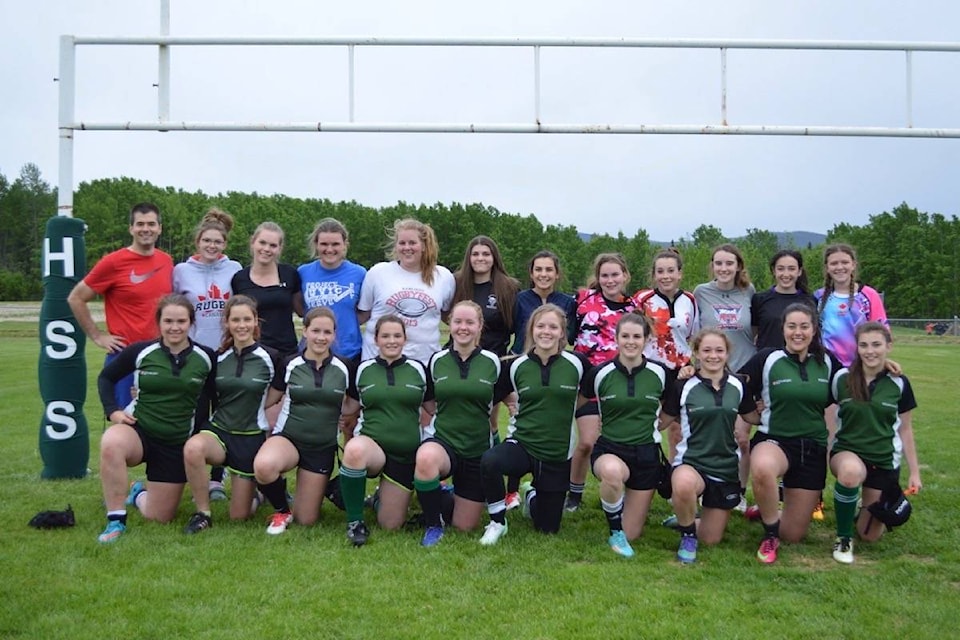 Alumbi and current Houston secondary girl’s rugby athletes on June 5.