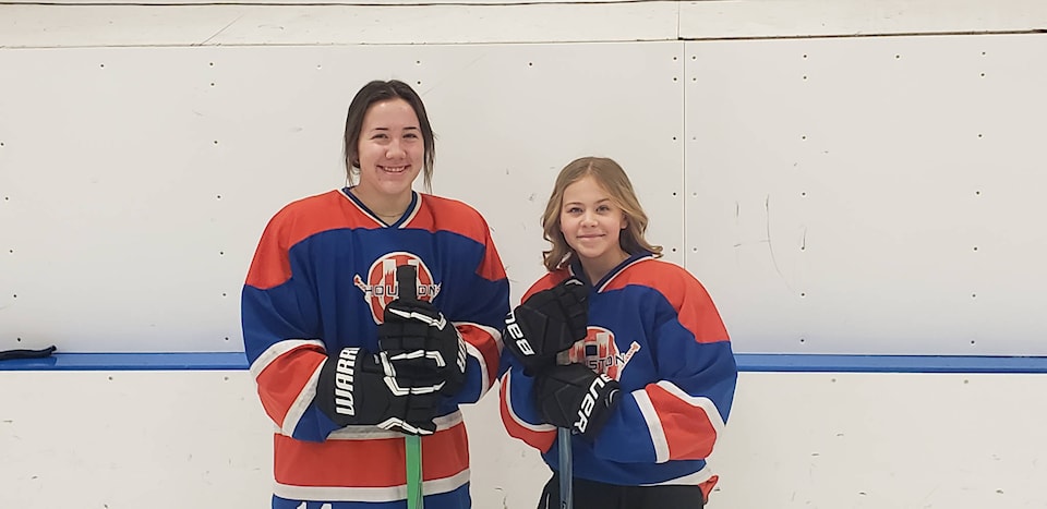 20410890_web1_200212-HTO-ringette.team.winter.games-_1