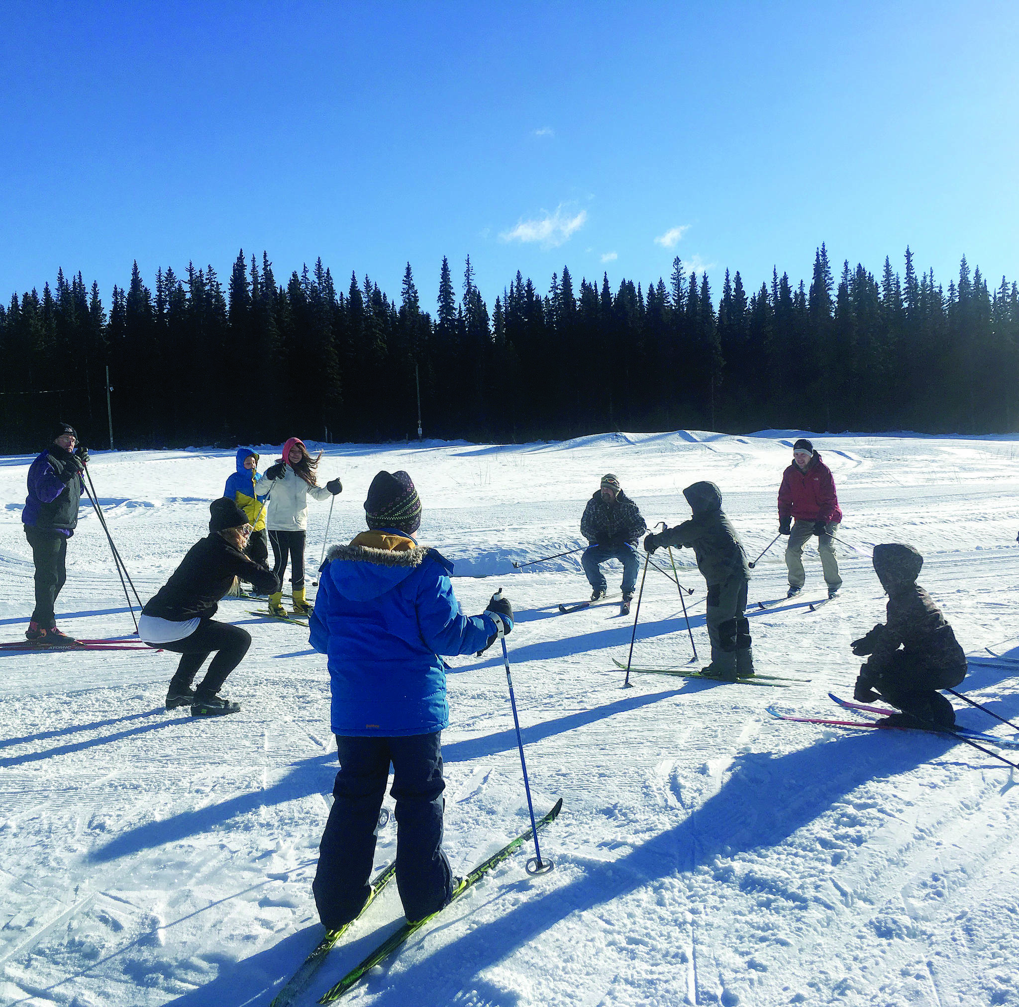 21474075_web1_170208-HTO-Group-warm-up-at-the-Morice-Mountain-Nordic-Ski-club_1