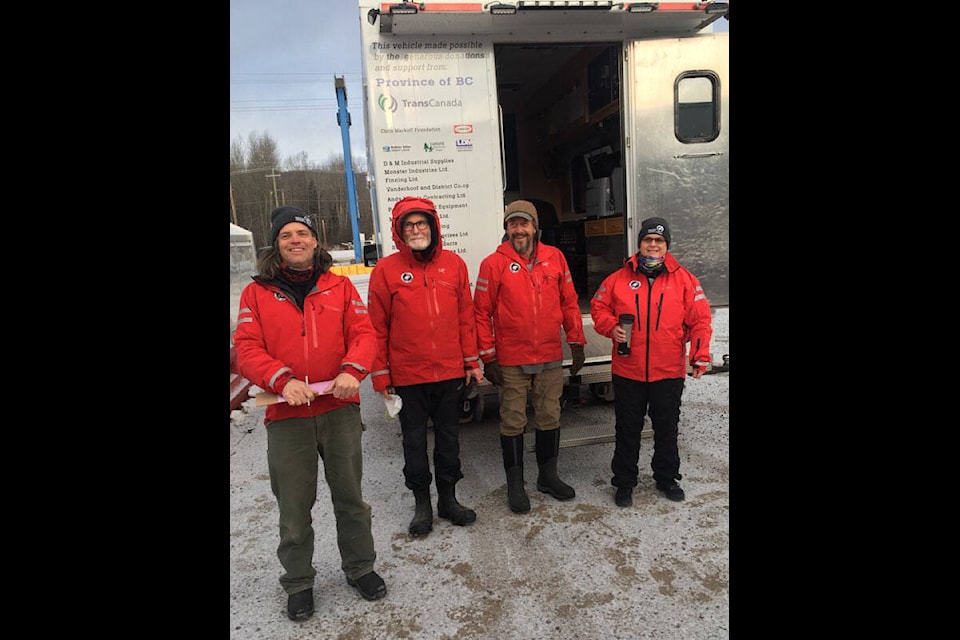 Houston Search and Rescue was represented at the Dec. 4 Cram the Cruiser event. From the left, Andy, Allan, Frank, and Kim. (Paul Batley photo)