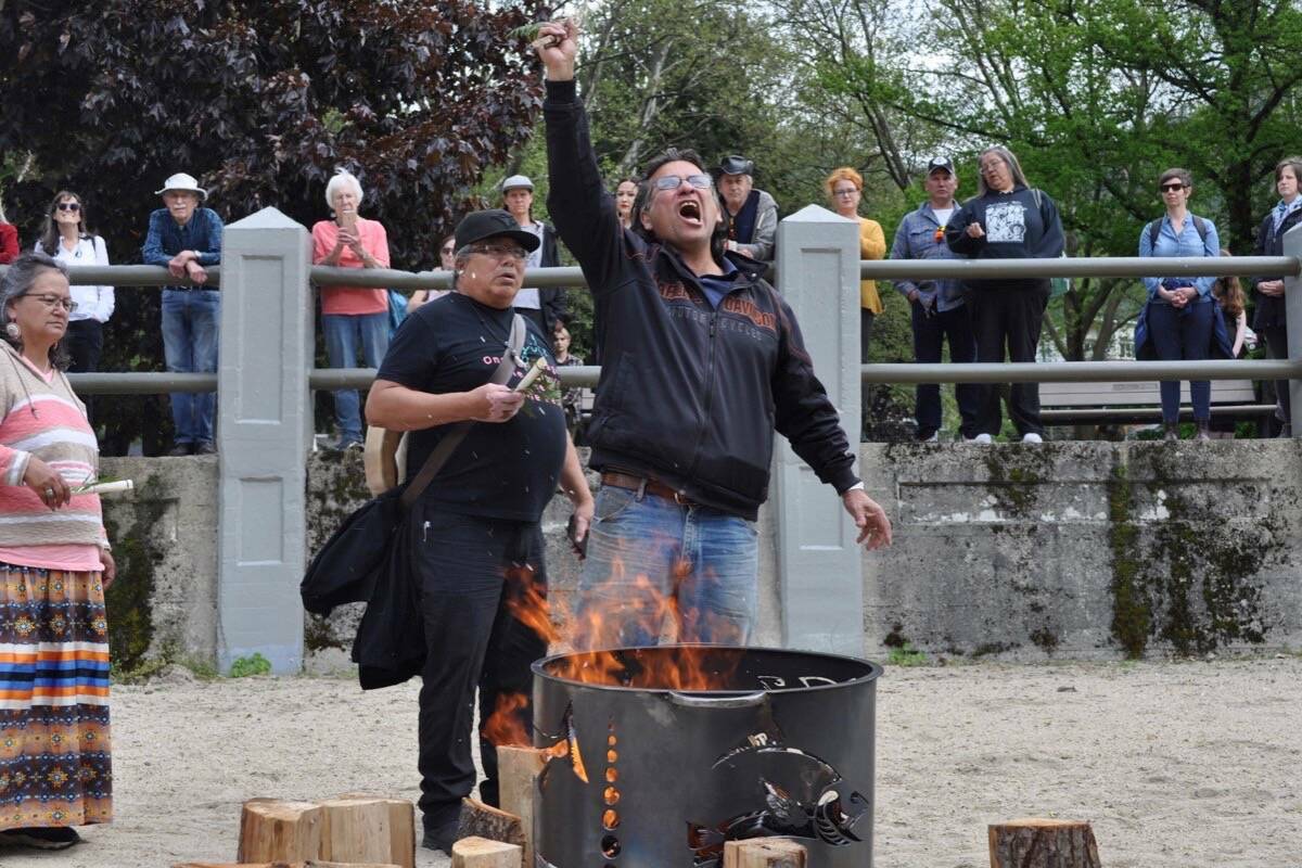 Gary Carden, a Sinixt man, yells in Nelson as he burns a copy of Canadas 1956 declaration that his people were extinct. (Tyler Harper - Nelson Star)