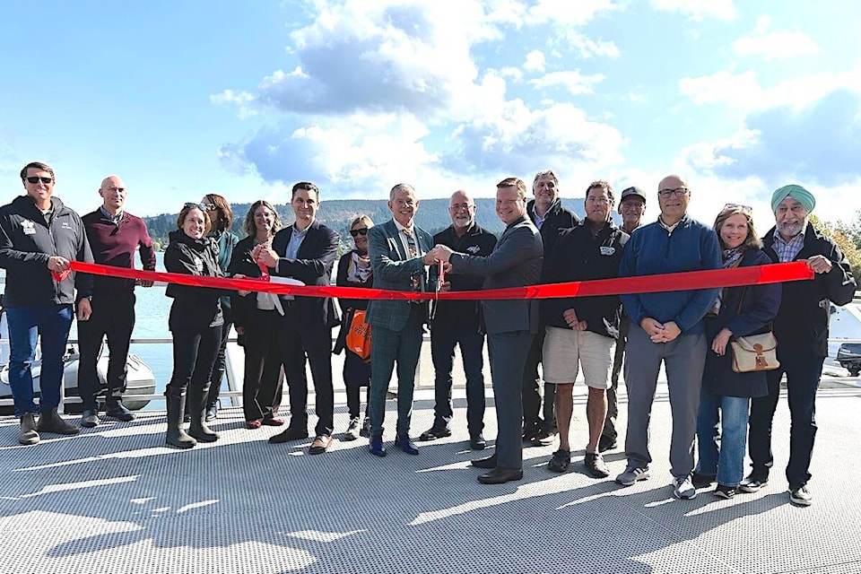 Dignitaries gather for the official ribbon cutting during the grand opening of the National Training Centre docks ahead of the 2023 National Rowing Championships on Quamichan Lake Thursday, Sept. 28. (Sarah Simpson/Citizen)