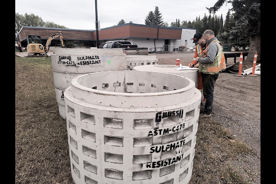 An improved roof drainage system in which piping will divert water to these large cement cylinders once placed in the ground is the latest project at the Houston Health Centre.