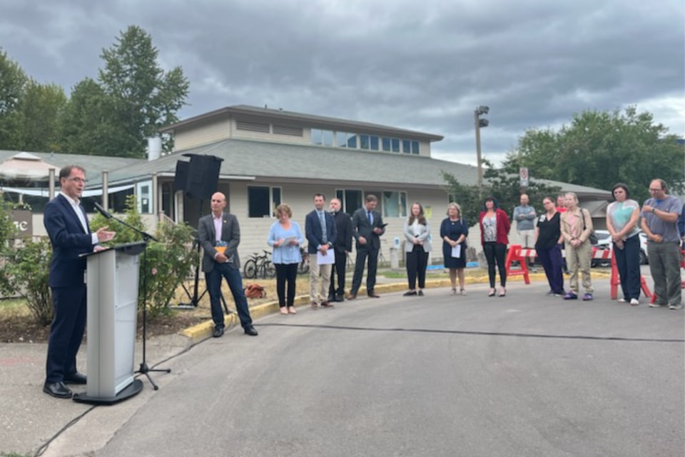 B.C. health minister Adrian Dix stands in front of Bulkley Lodge in Smithers Aug. 20 to announce a new 160-bed long-term care facility for the town.