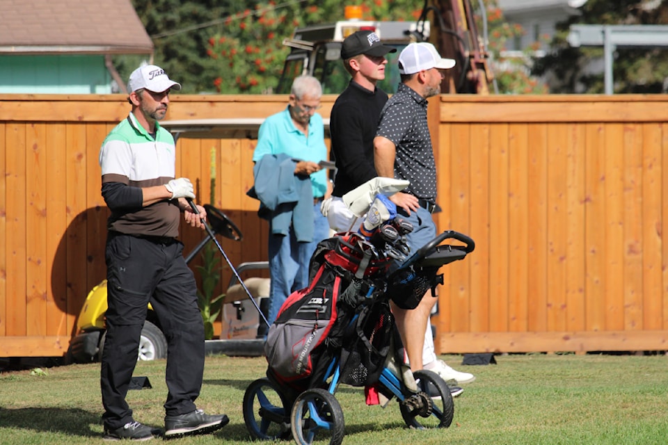 From left, Chris McGuiney, Joel Veenstra and Scott Rigler, the three leaders going into the third round of the 2024 Smithers Northern Men's Open, wait to tee of on the 10th hole Sept. 2