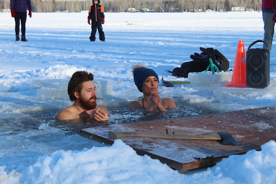 Approximately 20 people braved frigid air and water temps at Lake Kathlyn to ring in the new year on Jan. 1.