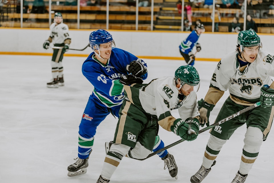 The Smithers Steelheads (dark) mix it up with the Williams Lake Stampeders Jan. 4.