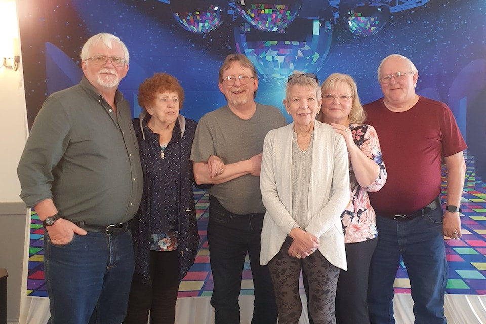 From left, Doug Walker, Barb Walker, Charlie Cook, Patti Walker, Laura Lee Walker, Dan Walker.