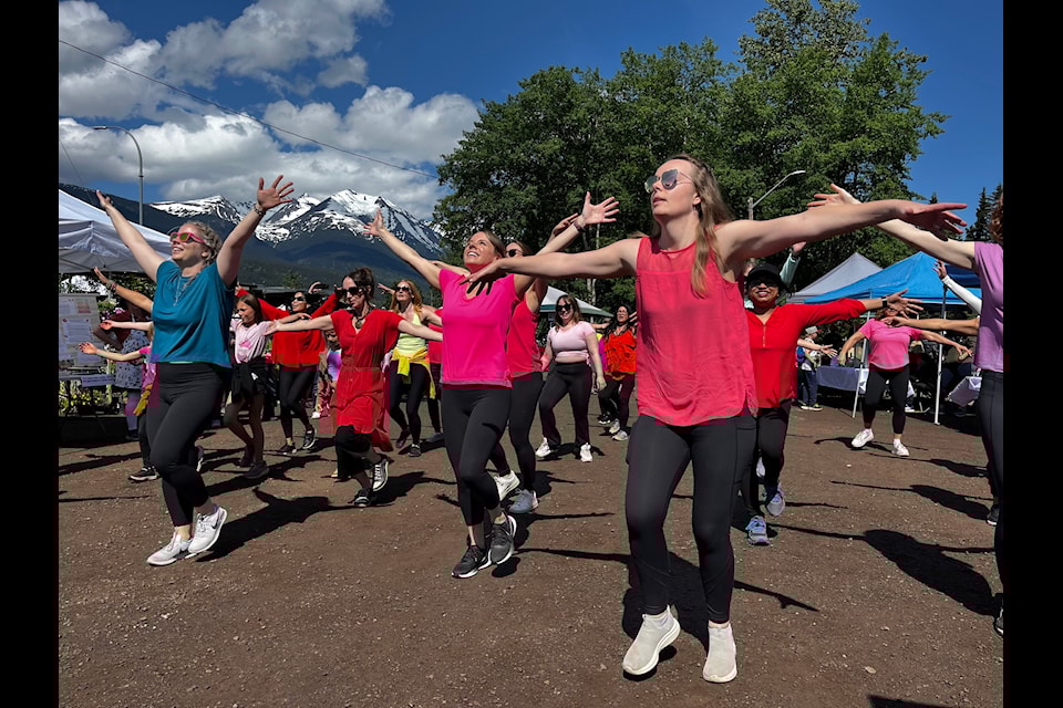 Dancers entertain during the Central Park building's 100th anniversary celebration. 