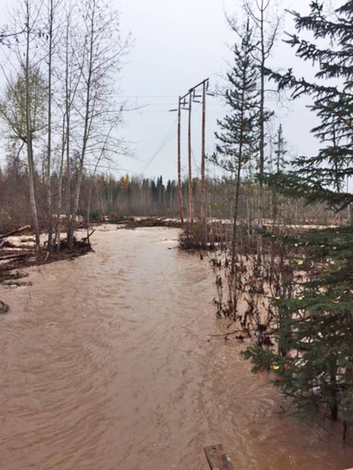 9124435_web1_Hydro-line-down-Telkwa-River
