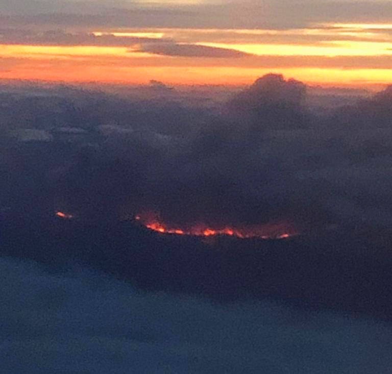 13170390_web1_wildfire-From-plane-to-Smithers-sunset
