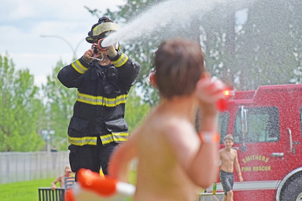 Kids face off against firefighters at BV Pool’s legendary water fight on July 25. (Trevor Hewitt photos)