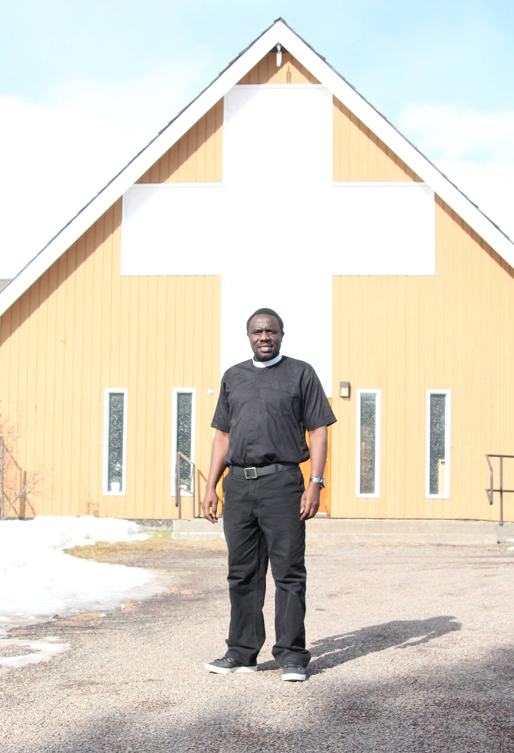 20943051_web1_200318-SIN-OUR-TOWN-fr-wilfred-alero-anglican-priest-church_1
