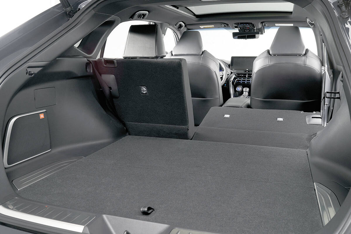 The battery pack that powers the three electric motors resides beneath the rear seat. The cargo capacity is slightly less than the RAV4s, but that has more to do with the RAV4s squarer shape. PHOTO: TOYOTA