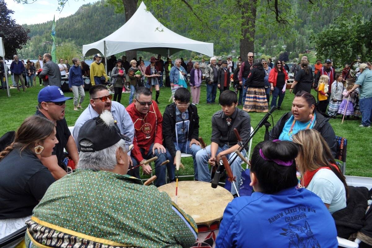 A Sinixt drum circle fills the air with song at Nelsons Lakeside Park. Photo: Tyler Harper
