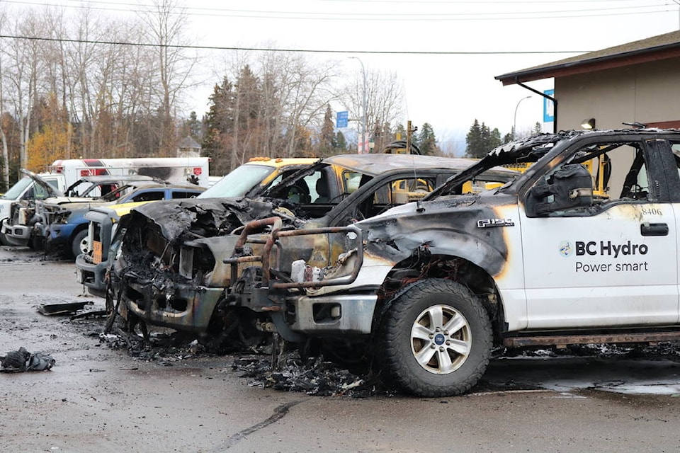 Several vehicles were damaged by an early morning blaze Wednesday between the Sunshine Inn and CIBC on Fourth Avenue in Smithers. (Kaitlyn Bailey photo)