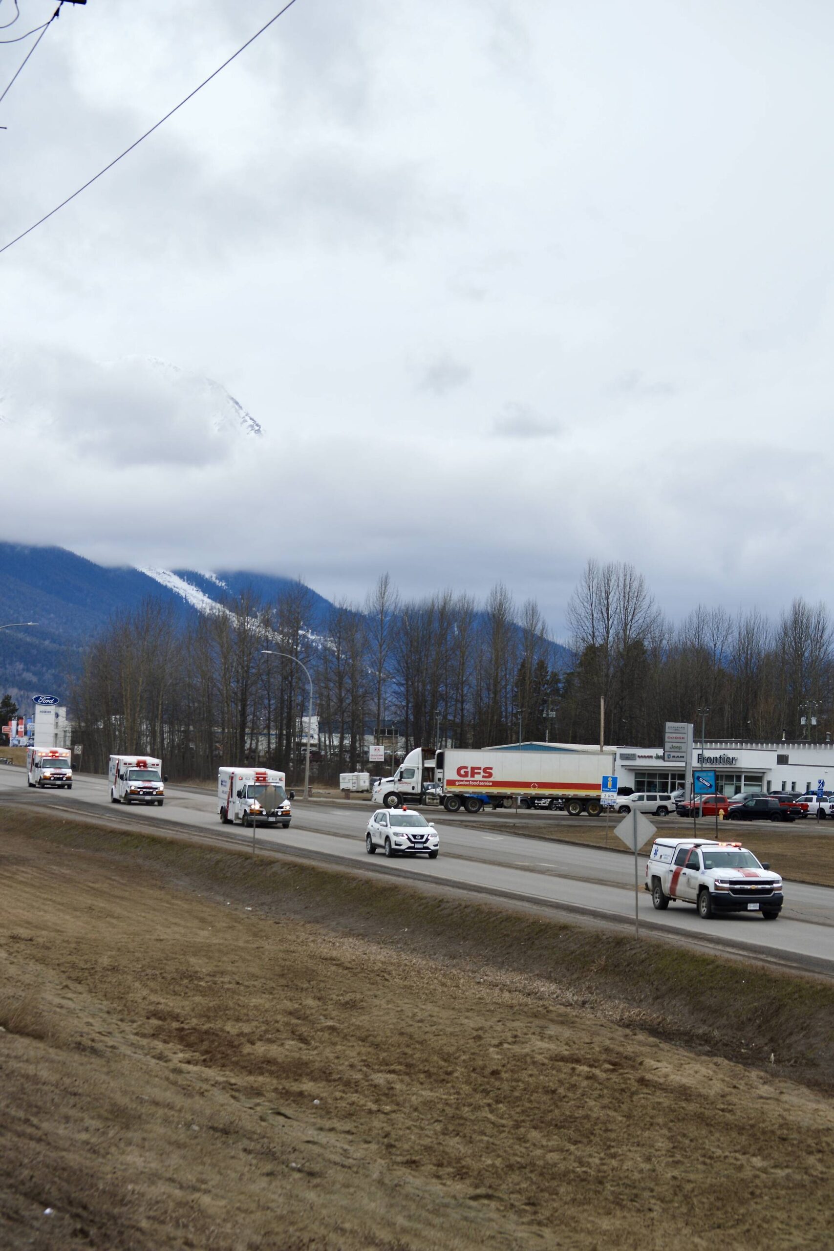 32334375_web1_230413-SIN-honourary-funeral-procession-for-Smithers-Paramedic-Highway-photo_1