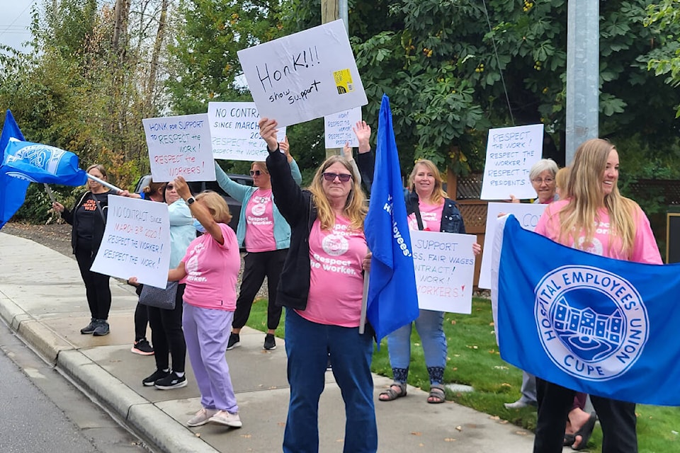 Hospital Employees Union members from Vernon’s Heron Grove hosted a two-hour rally outside the facility Wednesday, Sept. 27. Staff at Heron Grove and six other facilities owned and operated by the Good Samaritan Canada Society hosted rallies as they try to negotiate a new collective bargaining agreement. (Roger Knox - Black Press)