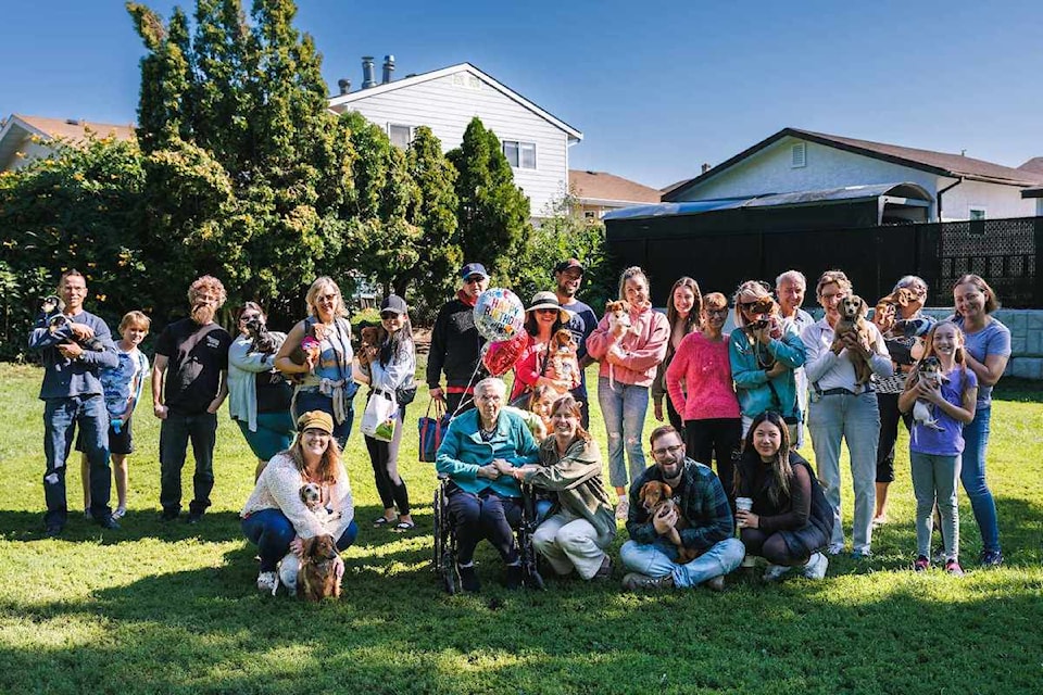 On Sunday, August 25, more than 20 people and their Dachshunds met at a park in Kelowna to surprise  Peggi Simonson for her 89th birthday.