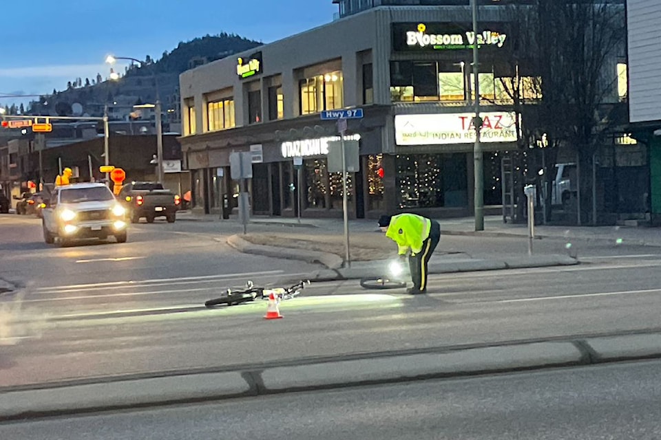 Kelowna RCMP investigate at Harvey Avenue and Water Street where a cyclist was struck by a semi-truck around 5:20 a.m. on Wednesday, Dec. 11.