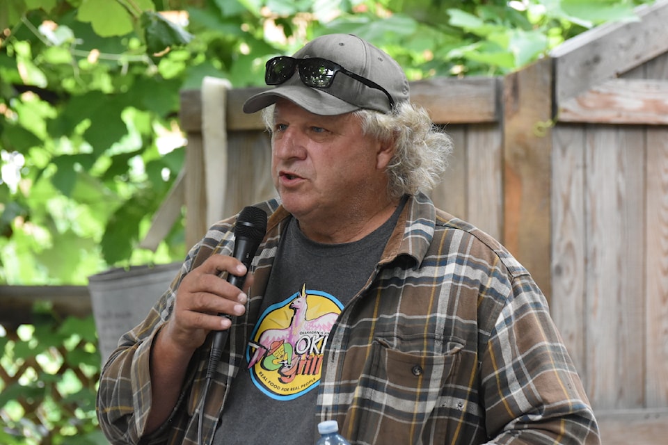Gatzke Orchard owner, Alan Gatzke, speaks about the difficulties facing Okanagan growers during a meet and greet with BC United members on July 30, 2024.
