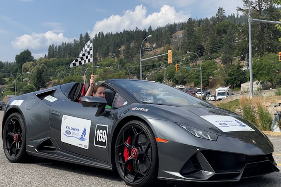 Vehicles participating in the 2024 Okanagan Dream Rally roll onto Beach Avenue in Peachland on their way back to  on July 27.