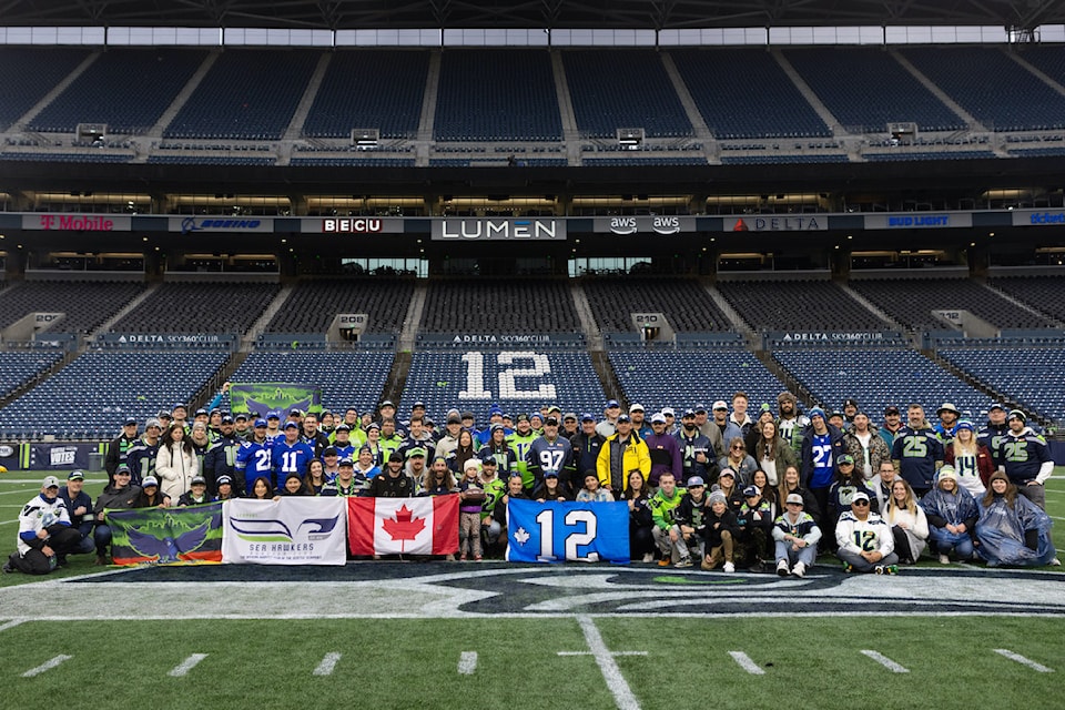 A group of NFL fans from the Central Okanagan attended the Seattle Seahawks 12North game, celebrating Canadian fans on Sunday, Oct. 27. The group got to take both the Canadian and American flags onto the field for the national anthems.