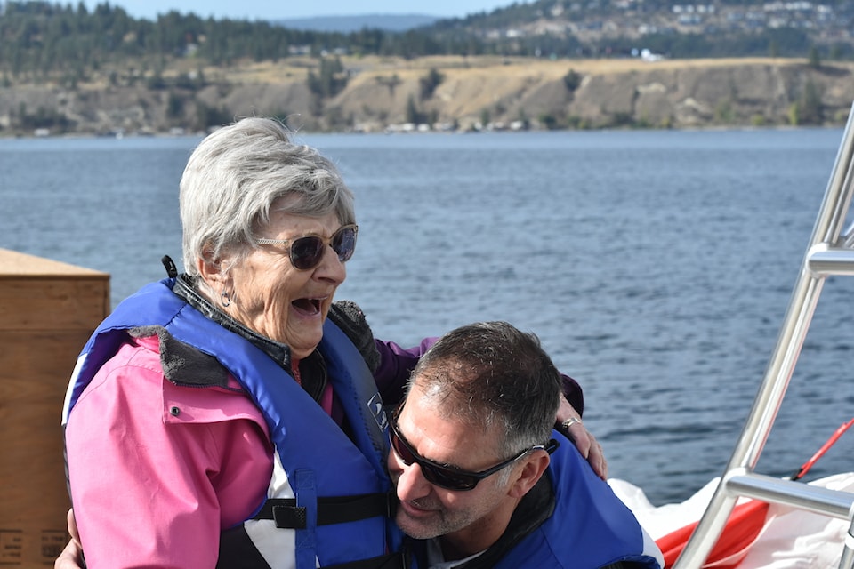 Lee Prunkl (right) spent her 95th birthday parasailing above Okanagan Lake with family member Troy Mamchur, who's also a member of the 鶹ѡ Fire Department.