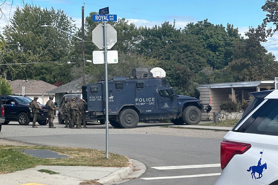 A police presence is focused on a home on Long Street, near Royal Avenue on Wednesday, Sept. 18.