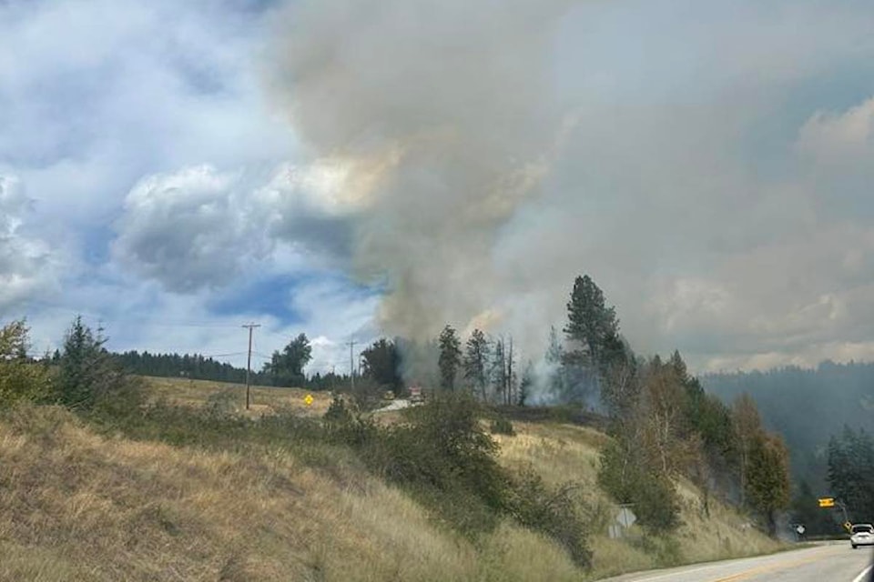 A wildfire sparked along Highway 33 near Goudie Road on Aug. 10, 2025. 