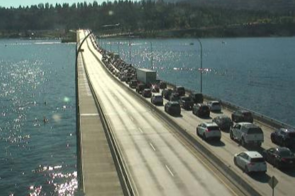 Bridge traffic between Kelowna and West Kelowna is stalled for a police incident on Aug. 11, 2025. 