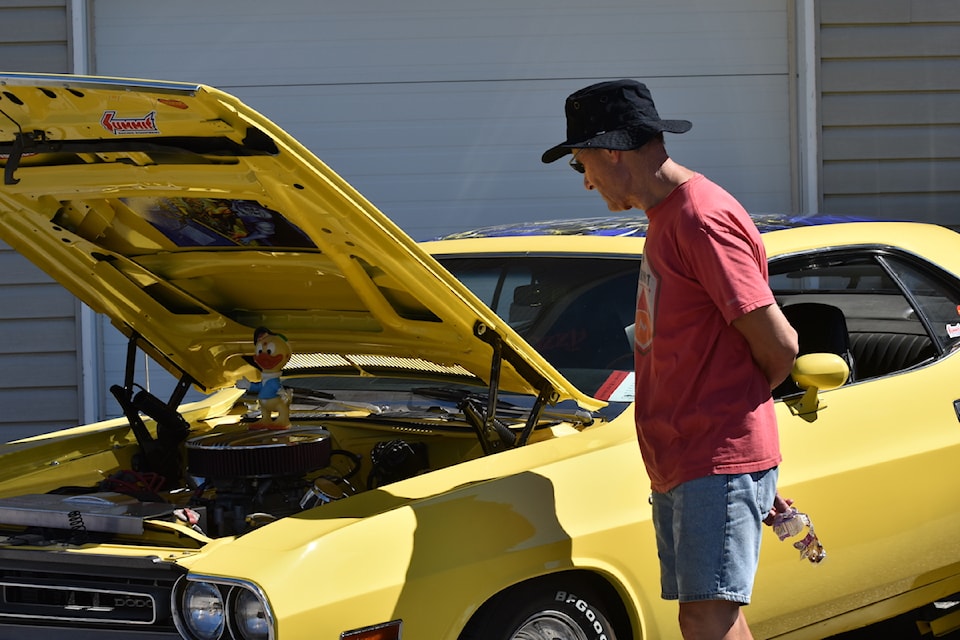 鶹ѡ residents got the chance to see hot rods and planes up close at the 鶹ѡ Flying Club's Wings and Wheels event at the 鶹ѡ International Airport on Saturday, Aug. 23.