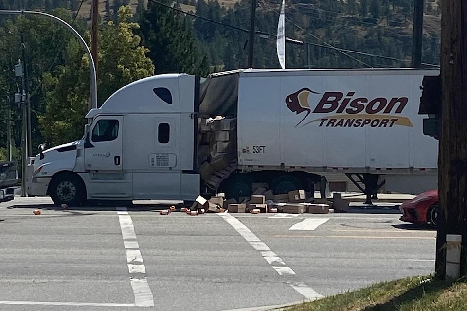 Boxes on the road are causing delays in traffic through Lake Country on June 26, 2025. 