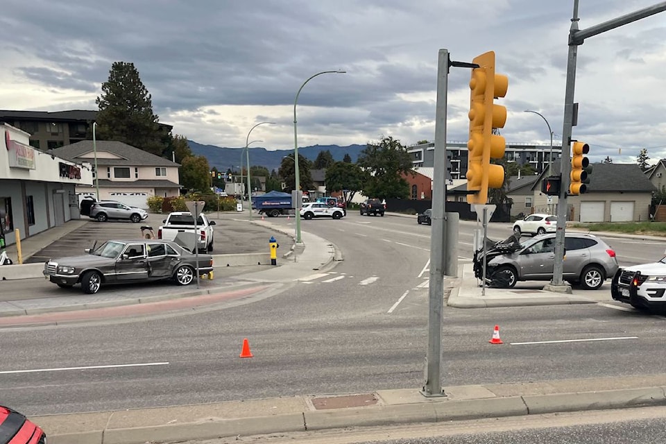 Two car collision causes traffic trouble.